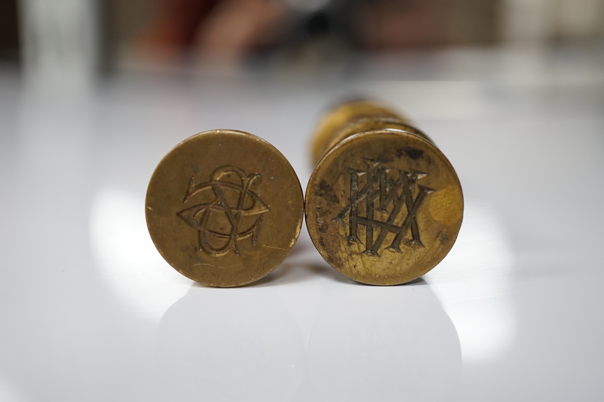 A 19th century agate and gilt metal table seal with gilt snake decoration and a smaller lapis lazuli seal, tallest agate seal 7cm high (2). Condition - fair